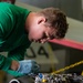 U.S. Sailor conducts mechanical installations aboard the aircraft carrier USS John C. Stennis (CVN 74)