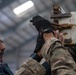 Coalition Forces members distribute pallets of medical supplies to SDF, local doctors