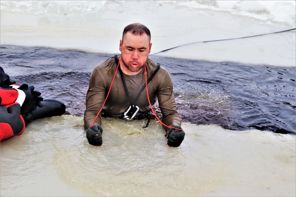 Students participate in cold-water immersion training for CWOC Class 19-01 at Fort McCoy