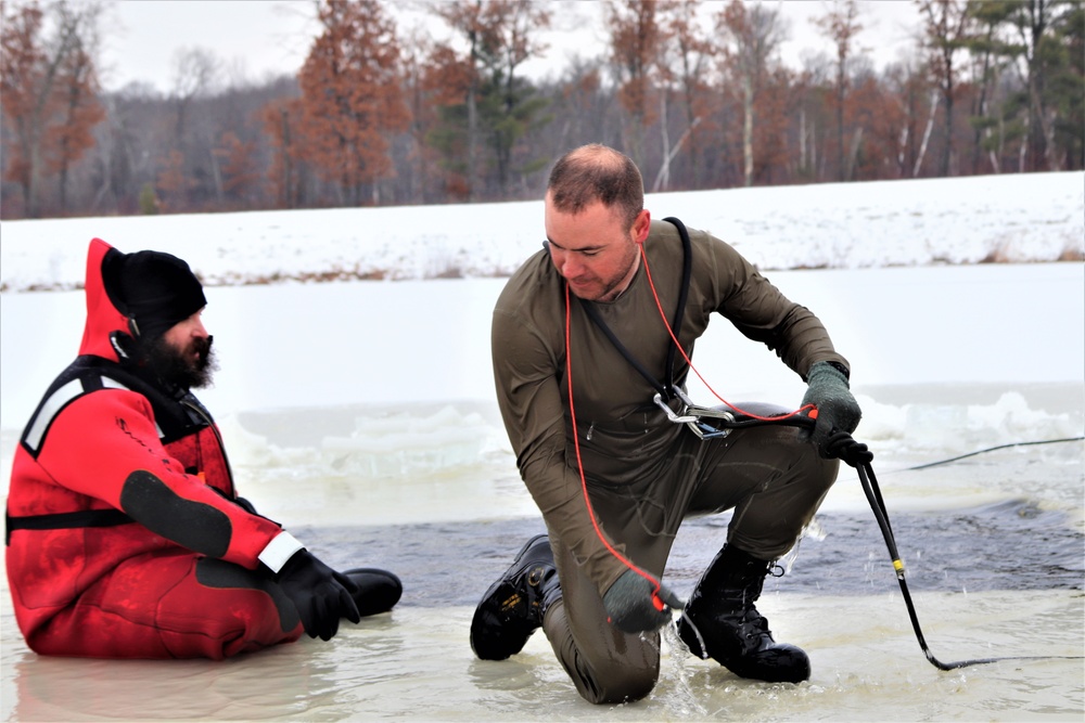 Students participate in cold-water immersion training for CWOC Class 19-01 at Fort McCoy