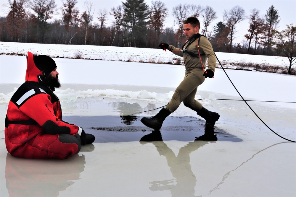 Students participate in cold-water immersion training for CWOC Class 19-01 at Fort McCoy