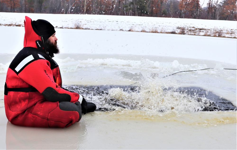 Students participate in cold-water immersion training for CWOC Class 19-01 at Fort McCoy