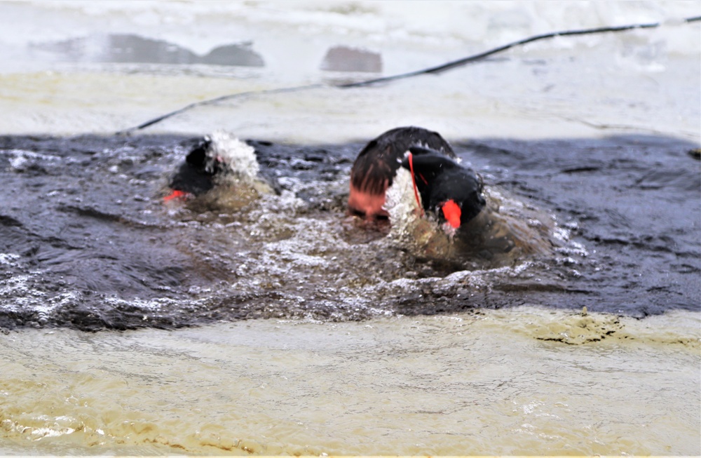 Students participate in cold-water immersion training for CWOC Class 19-01 at Fort McCoy