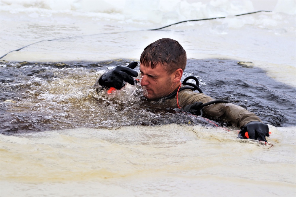 Students participate in cold-water immersion training for CWOC Class 19-01 at Fort McCoy