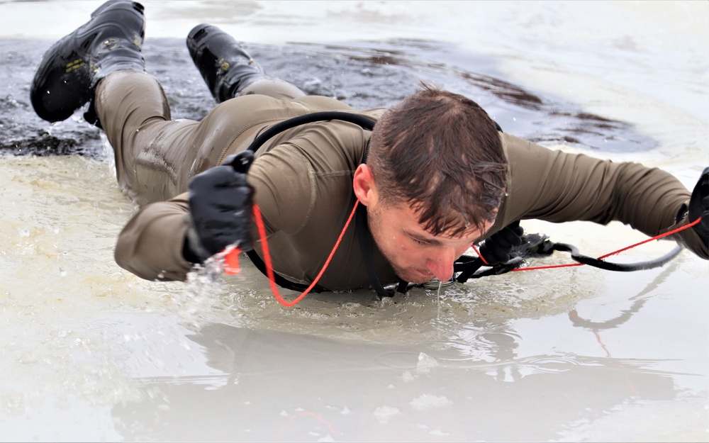 Students participate in cold-water immersion training for CWOC Class 19-01 at Fort McCoy