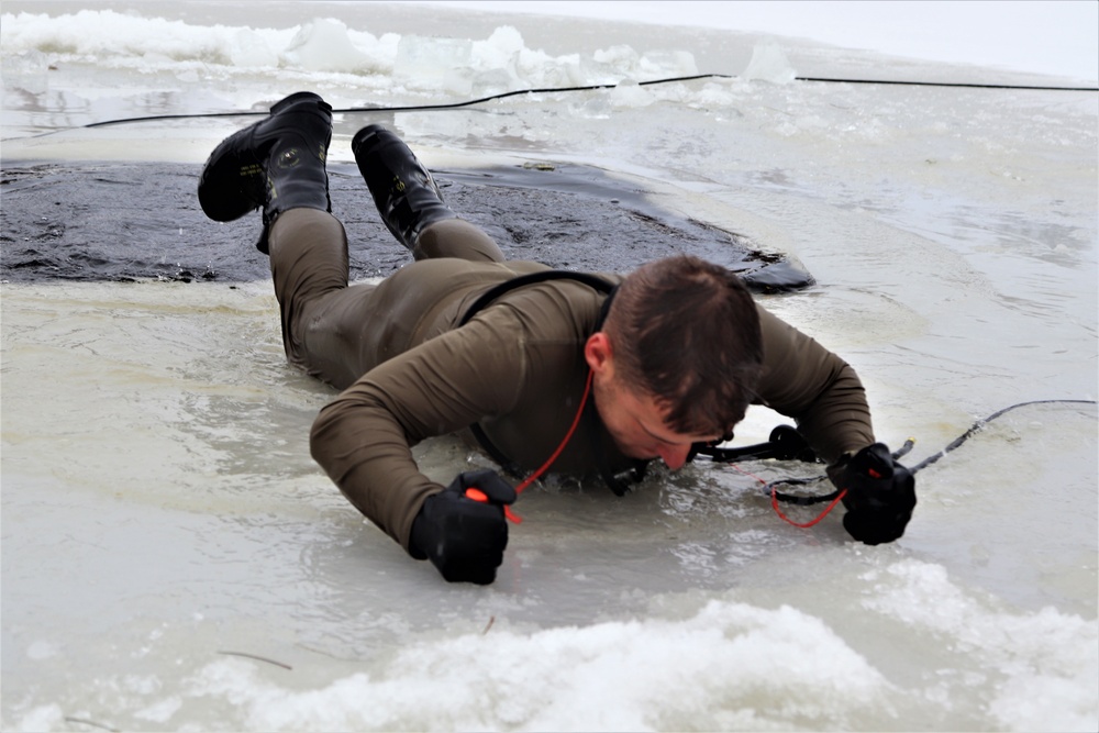 Students participate in cold-water immersion training for CWOC Class 19-01 at Fort McCoy