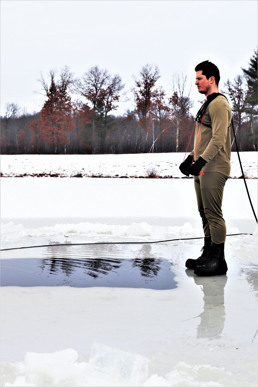 Students participate in cold-water immersion training for CWOC Class 19-01 at Fort McCoy