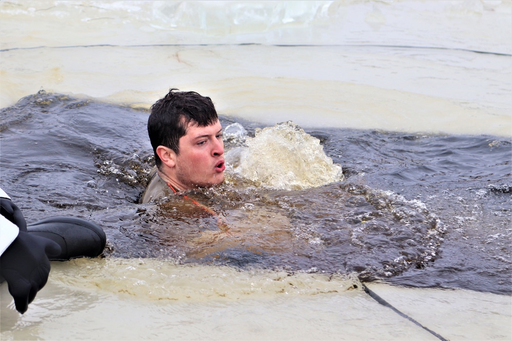 Students participate in cold-water immersion training for CWOC Class 19-01 at Fort McCoy