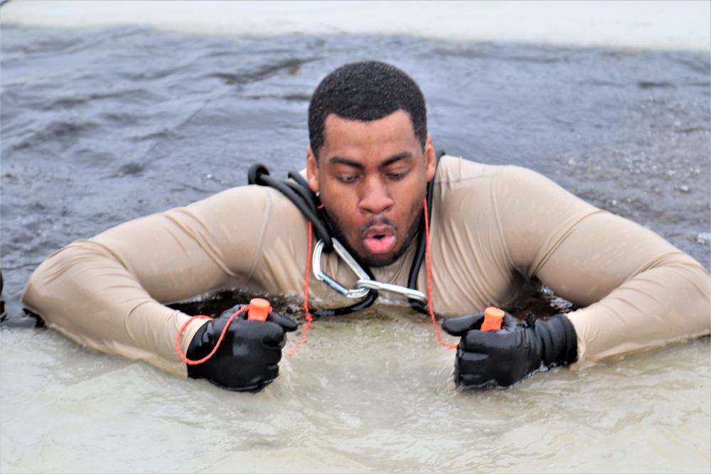 Students participate in cold-water immersion training for CWOC Class 19-01 at Fort McCoy