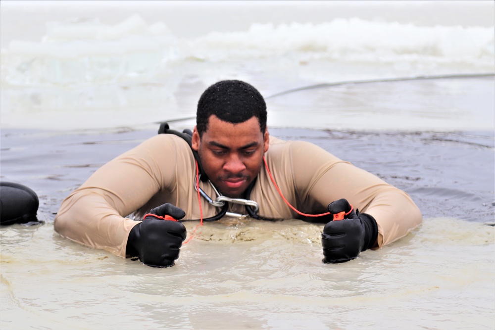 Students participate in cold-water immersion training for CWOC Class 19-01 at Fort McCoy