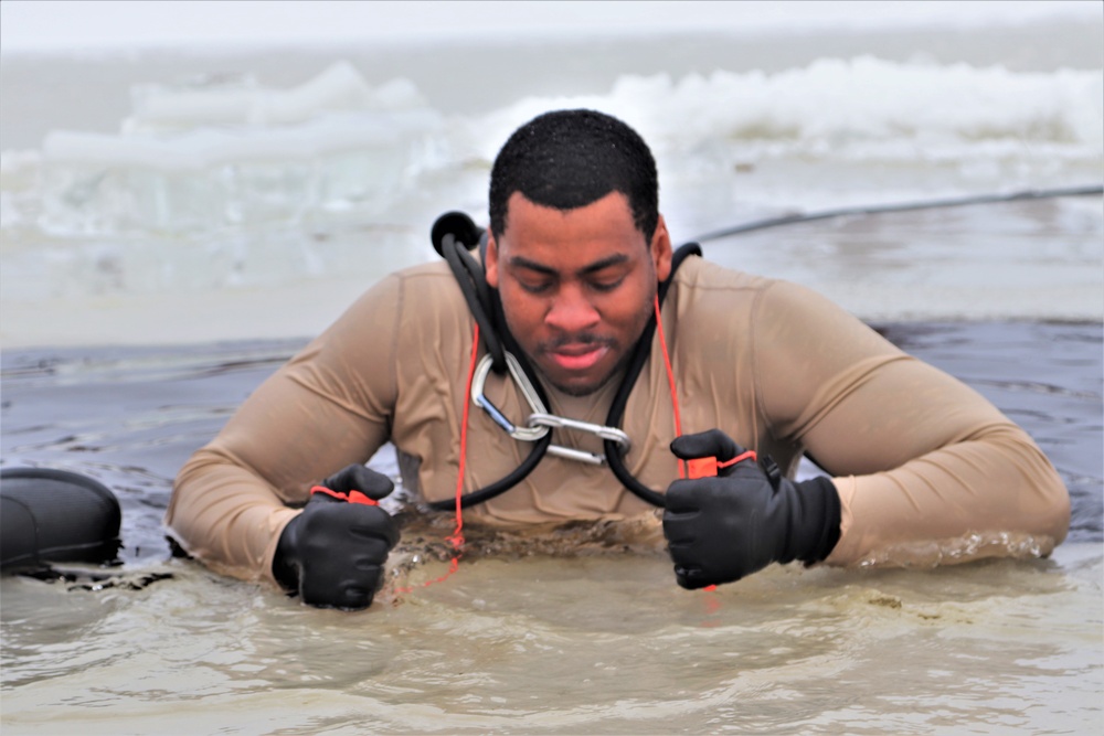 Students participate in cold-water immersion training for CWOC Class 19-01 at Fort McCoy
