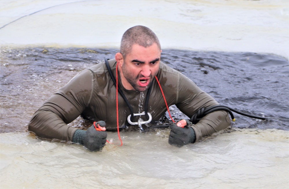 Students participate in cold-water immersion training for CWOC Class 19-01 at Fort McCoy