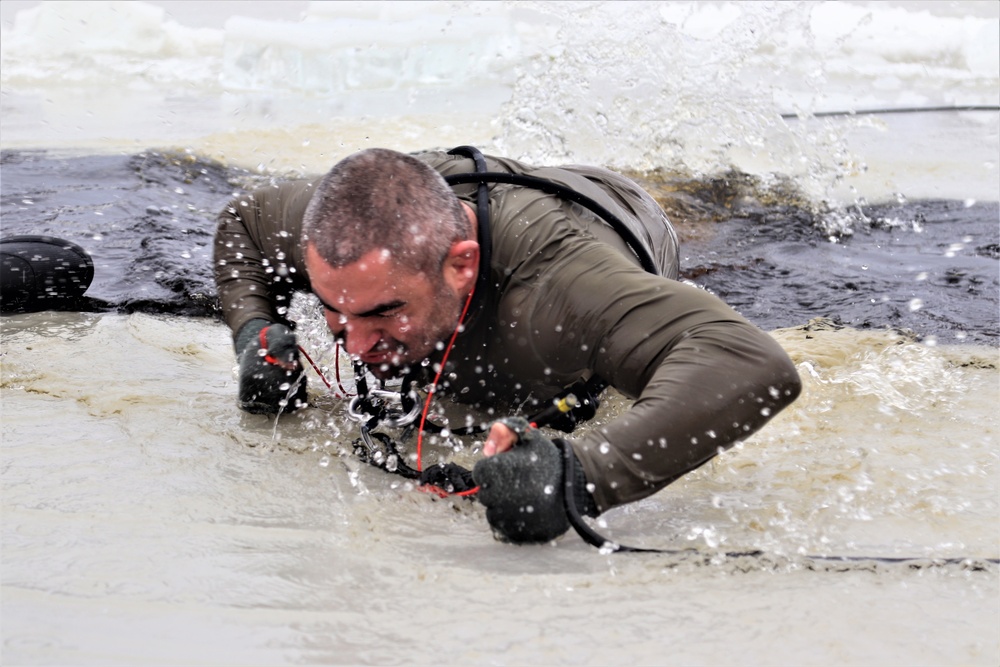 Students participate in cold-water immersion training for CWOC Class 19-01 at Fort McCoy