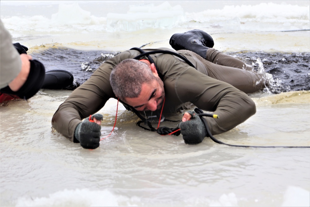 Students participate in cold-water immersion training for CWOC Class 19-01 at Fort McCoy