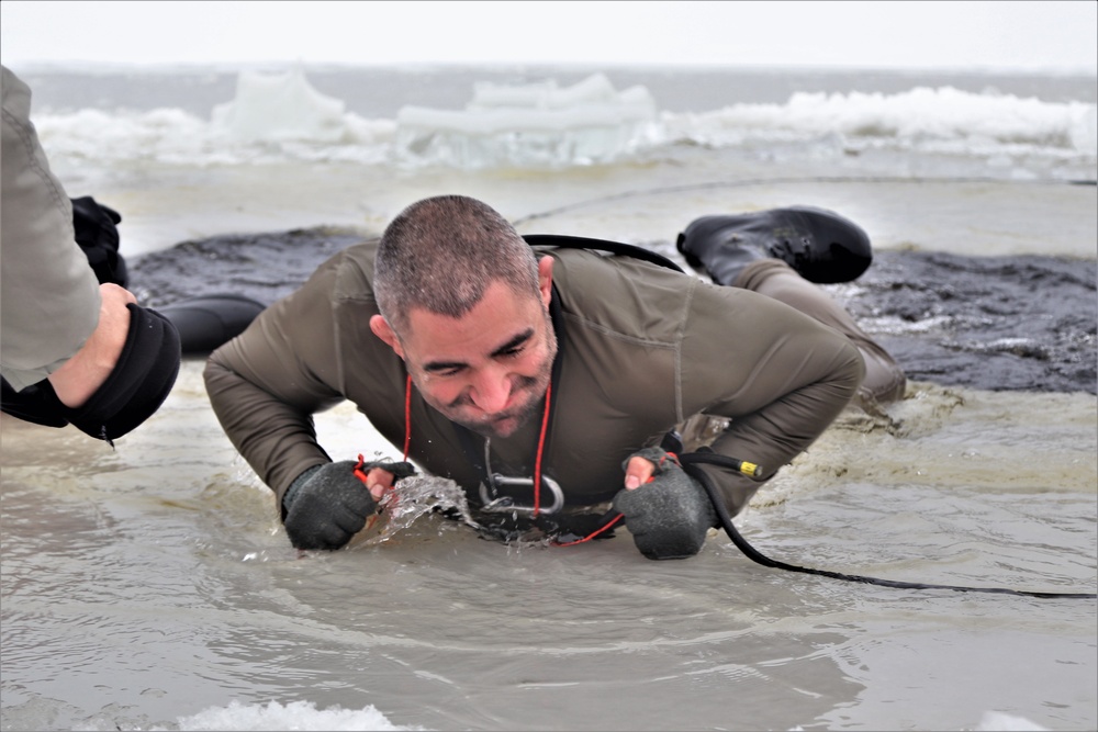 Students participate in cold-water immersion training for CWOC Class 19-01 at Fort McCoy