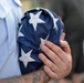 Past and present Coast Guard Cutter Sherman crewmembers honor the cutter’s final colors