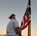 Past and present Coast Guard Cutter Sherman crewmembers honor the cutter’s final colors