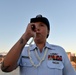 Past and present Coast Guard Cutter Sherman crewmembers honor the cutter’s final colors