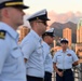 Past and present Coast Guard Cutter Sherman crewmembers honor the cutter’s final colors