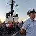 Past and present Coast Guard Cutter Sherman crewmembers honor the cutter’s final colors