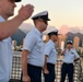 Past and present Coast Guard Cutter Sherman crewmembers honor the cutter’s final colors