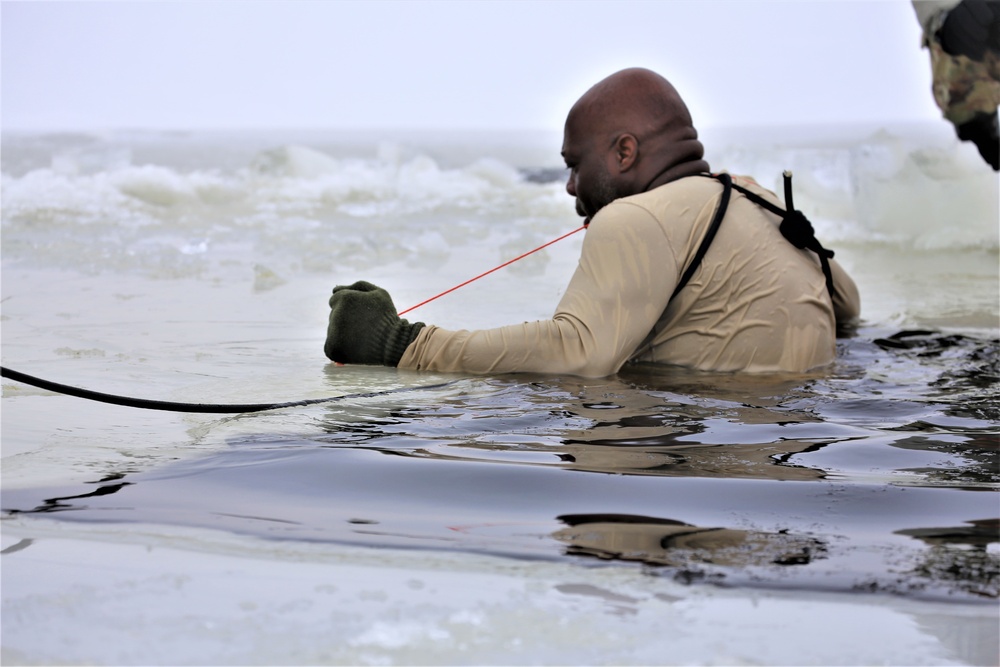 Students participate in cold-water immersion training for CWOC Class 19-01 at Fort McCoy