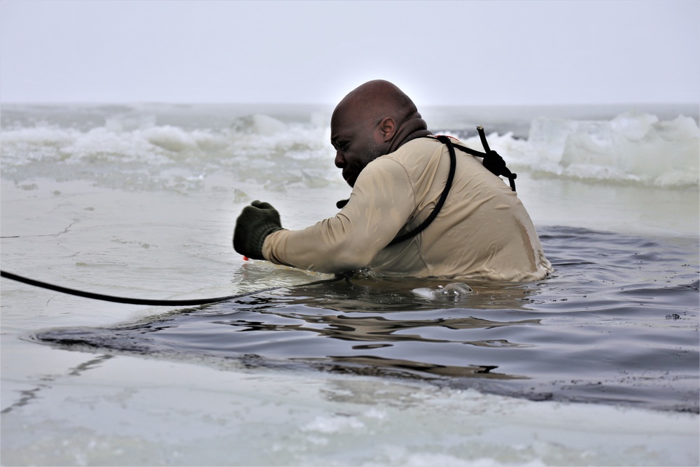 Students participate in cold-water immersion training for CWOC Class 19-01 at Fort McCoy