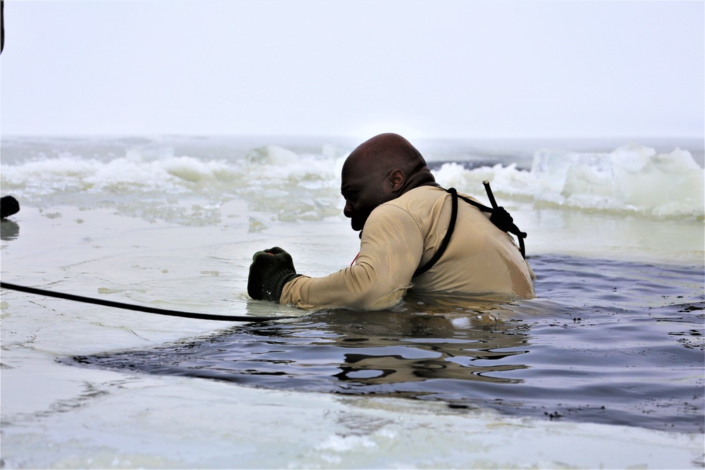 Students participate in cold-water immersion training for CWOC Class 19-01 at Fort McCoy