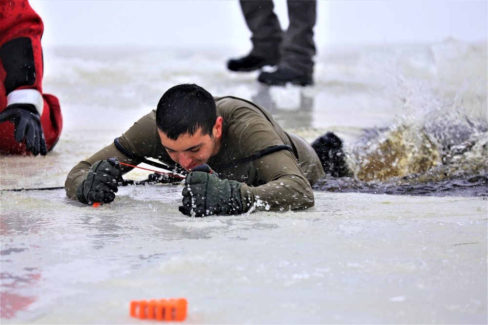 Students participate in cold-water immersion training for CWOC Class 19-01 at Fort McCoy