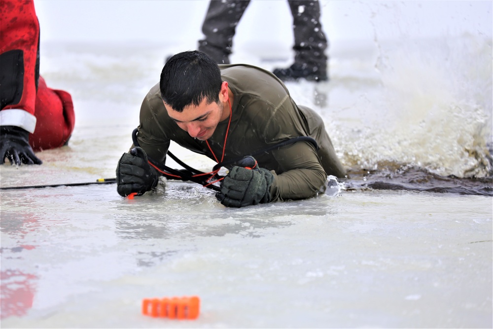 Students participate in cold-water immersion training for CWOC Class 19-01 at Fort McCoy