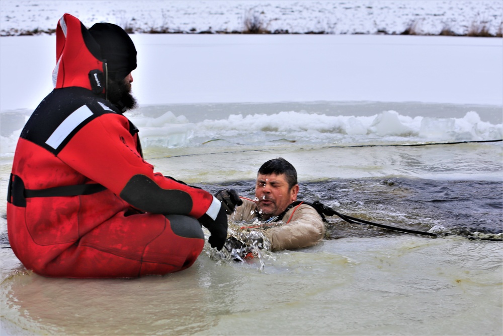 Students participate in cold-water immersion training for CWOC Class 19-01 at Fort McCoy