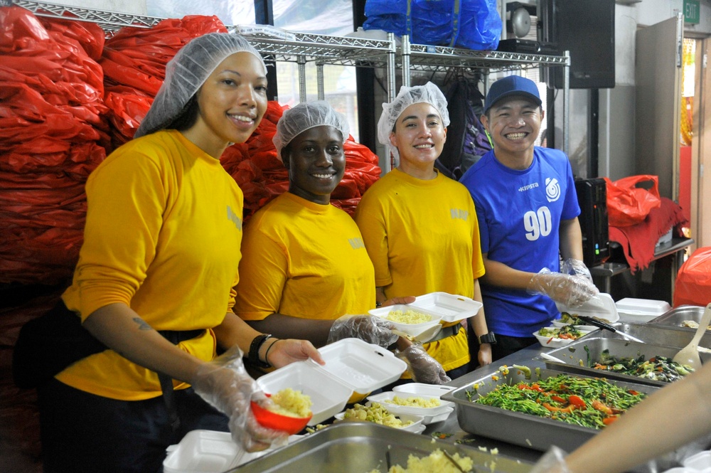 Emory S. Land Sailors volunteer at Singapore Soup Kitchen