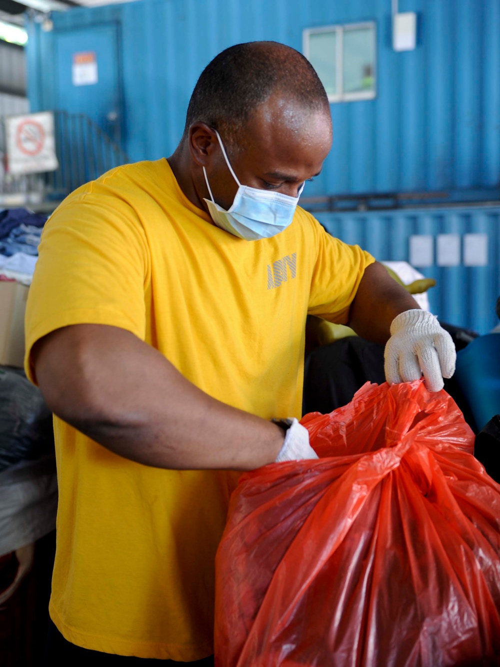 Emory S. Land Sailors Volunteer at Salvation Army in Singapore