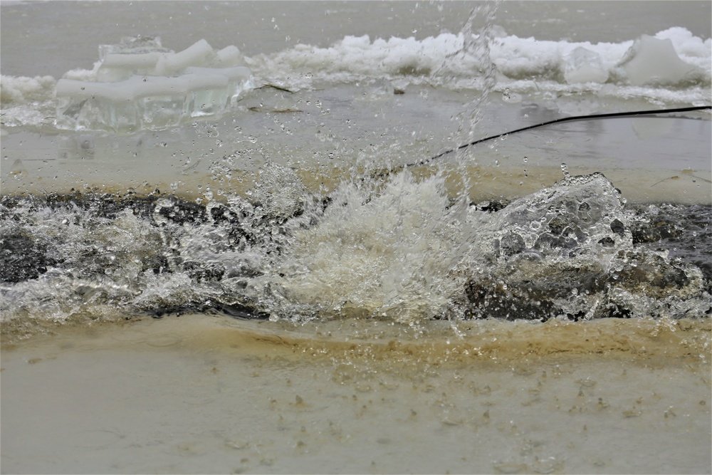 Students take plunge for cold-water immersion training at Fort McCoy