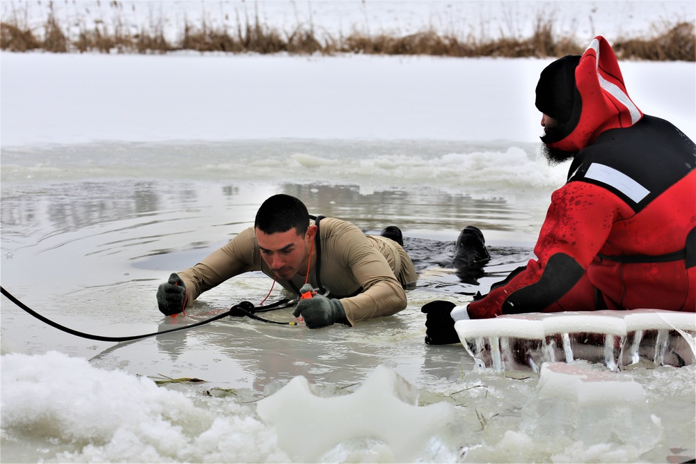 Cold-water immersion training by CWOC students at Fort McCoy