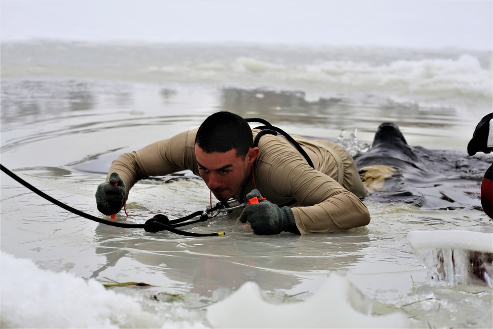 Cold-water immersion training by CWOC students at Fort McCoy