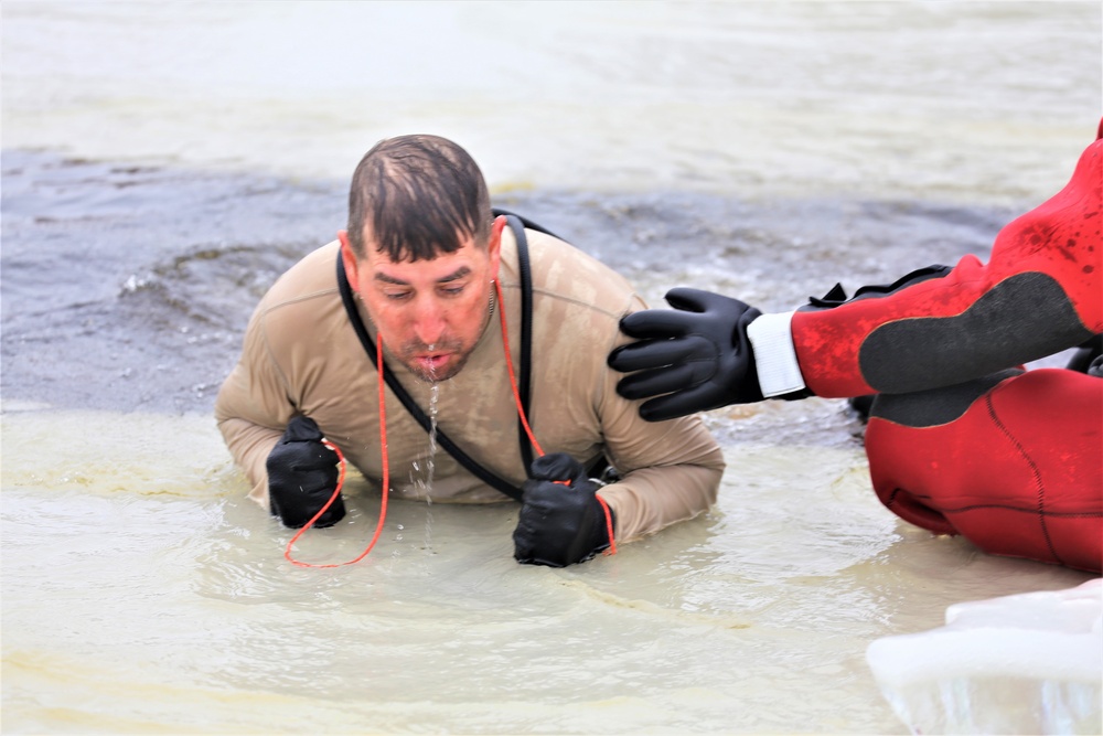 Cold-water immersion training by CWOC students at Fort McCoy