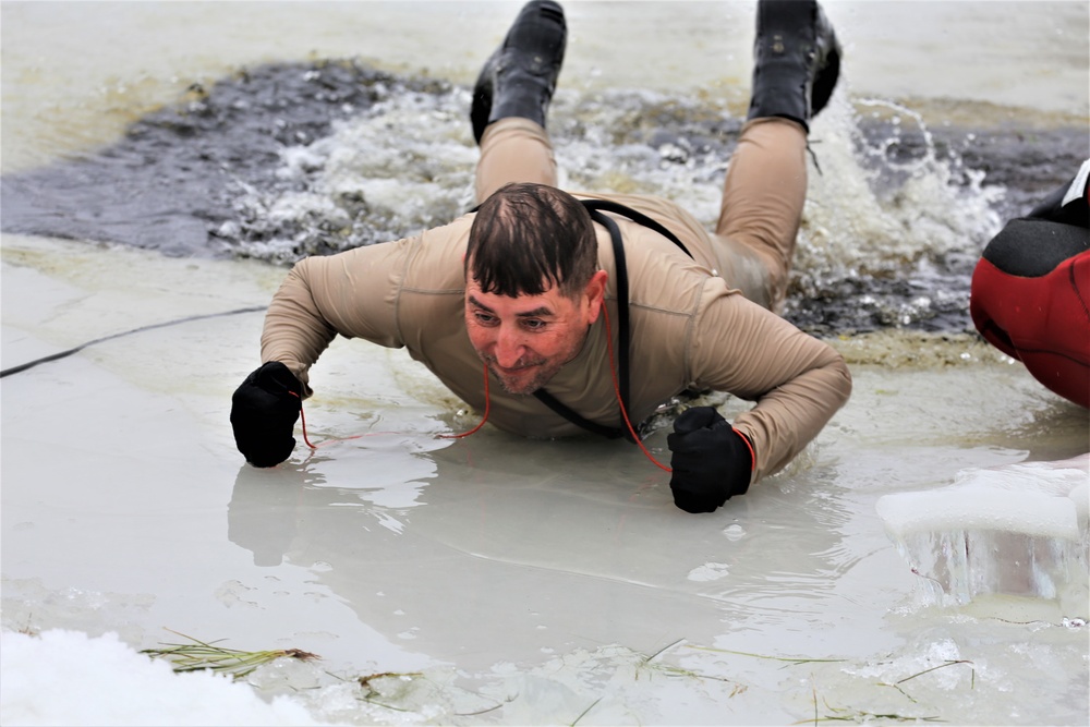 Cold-water immersion training by CWOC students at Fort McCoy