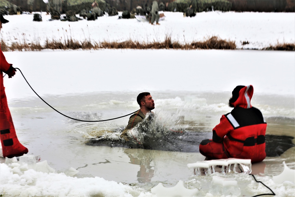 Cold-water immersion training by CWOC students at Fort McCoy