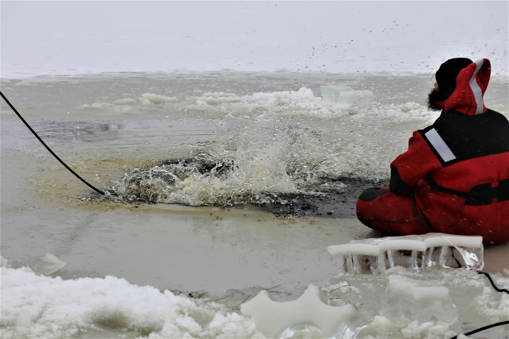 Cold-water immersion training by CWOC students at Fort McCoy