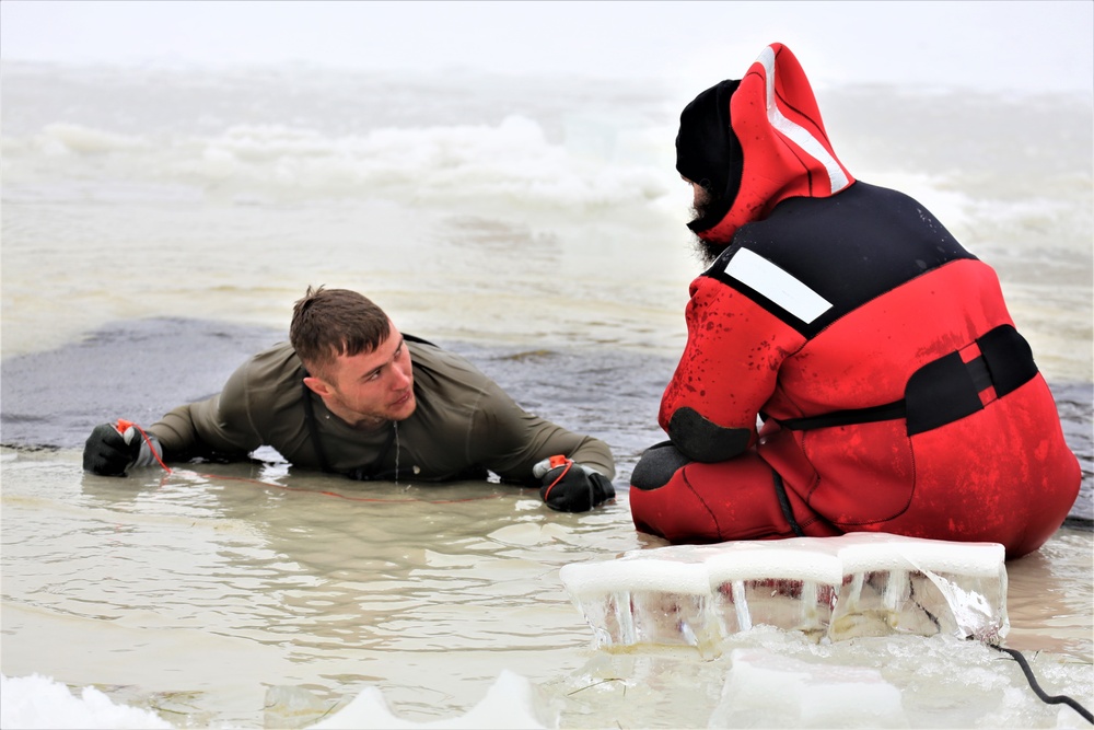 Cold-water immersion training by CWOC students at Fort McCoy