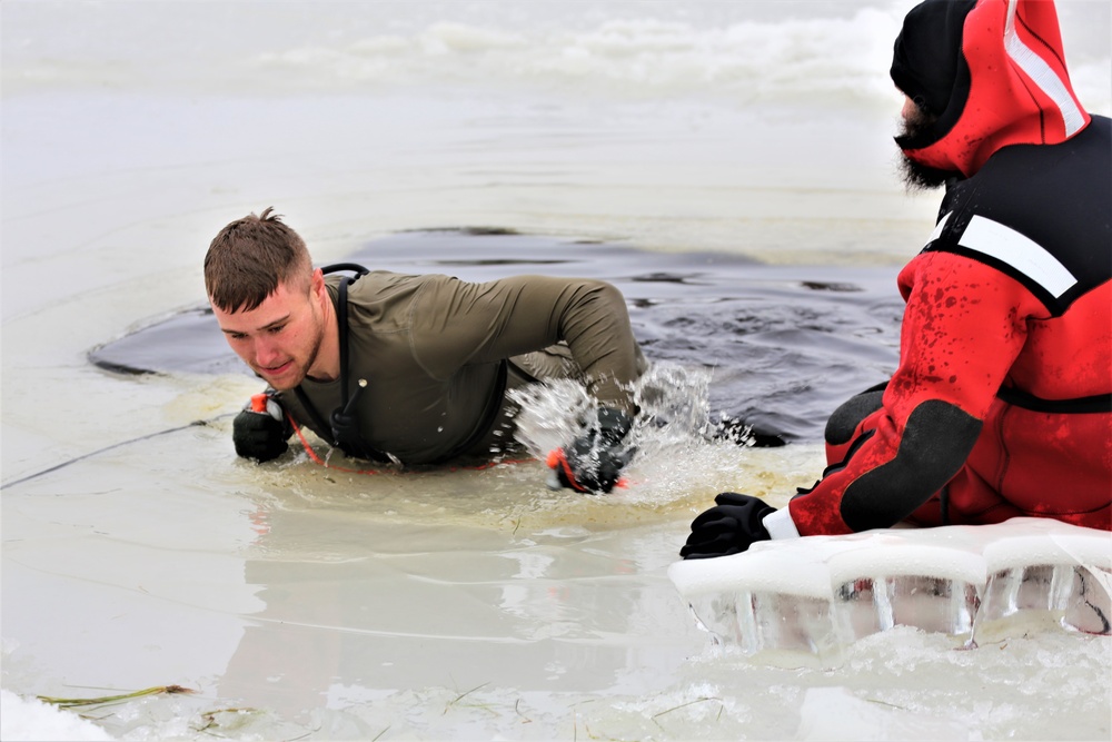 Cold-water immersion training by CWOC students at Fort McCoy