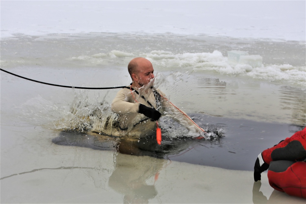 Cold-water immersion training by CWOC students at Fort McCoy