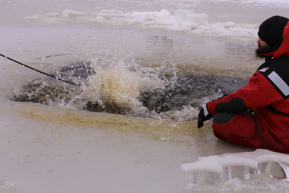 Cold-water immersion training by CWOC students at Fort McCoy