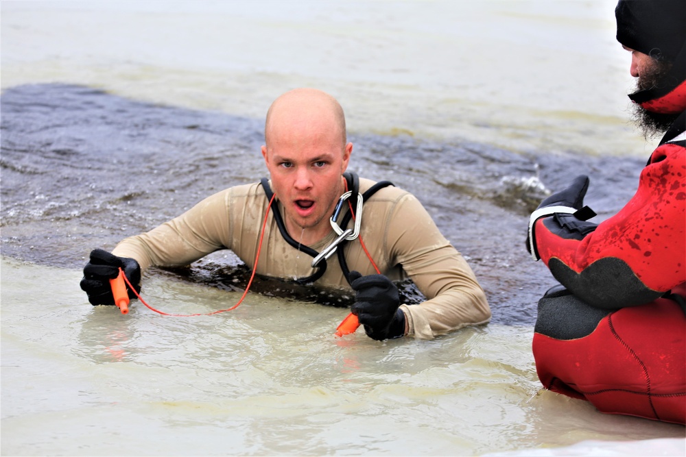 Cold-water immersion training by CWOC students at Fort McCoy