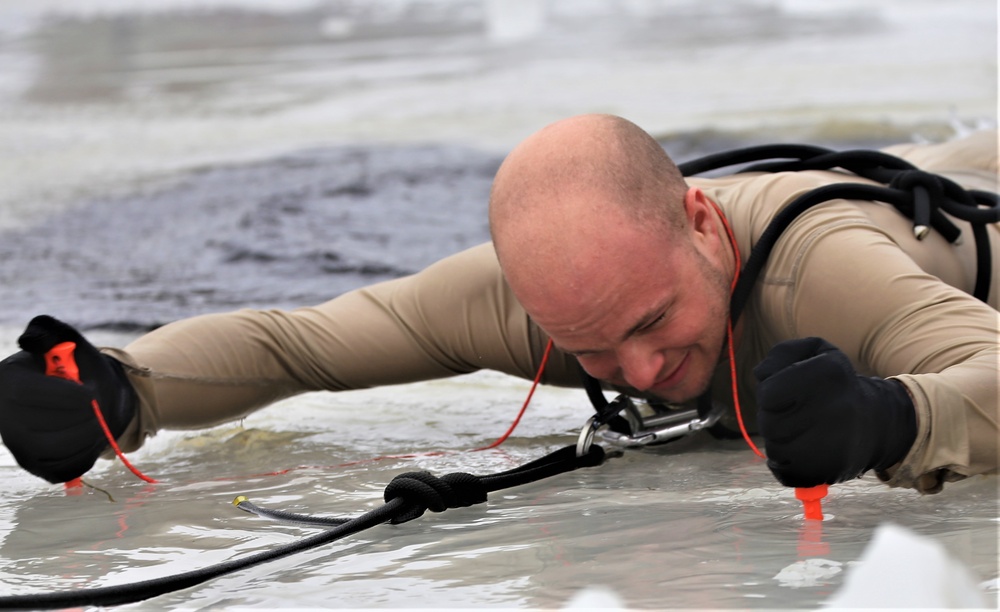 Cold-water immersion training by CWOC students at Fort McCoy