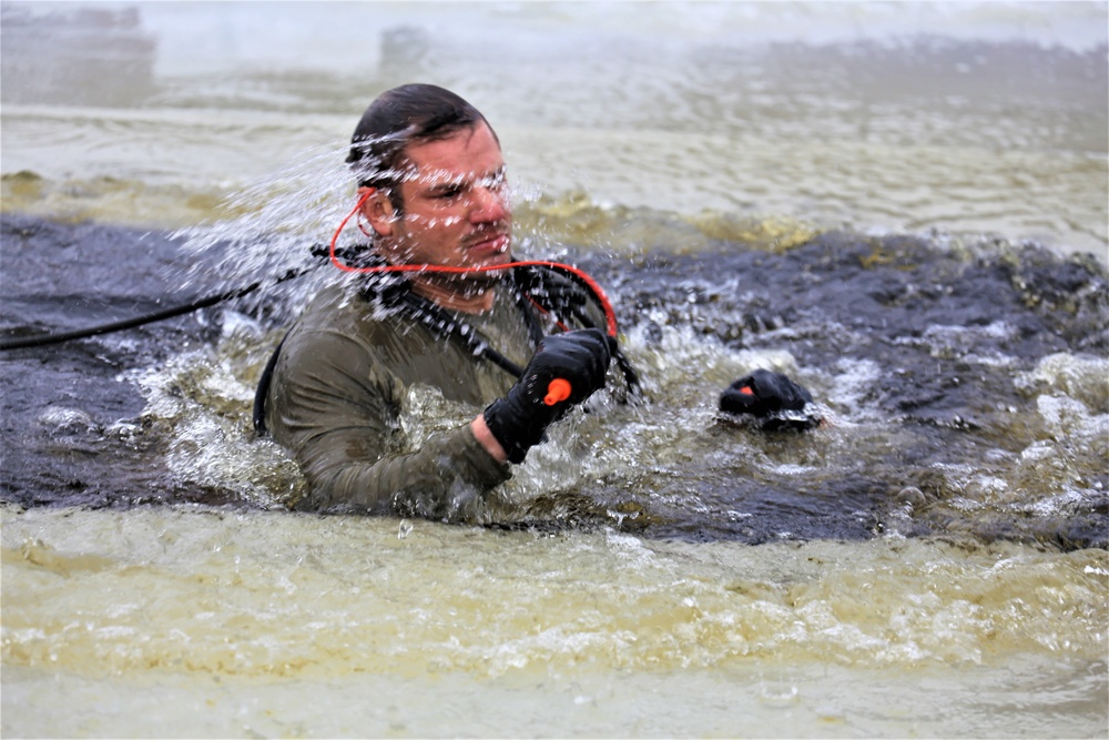 Cold-water immersion training by CWOC students at Fort McCoy