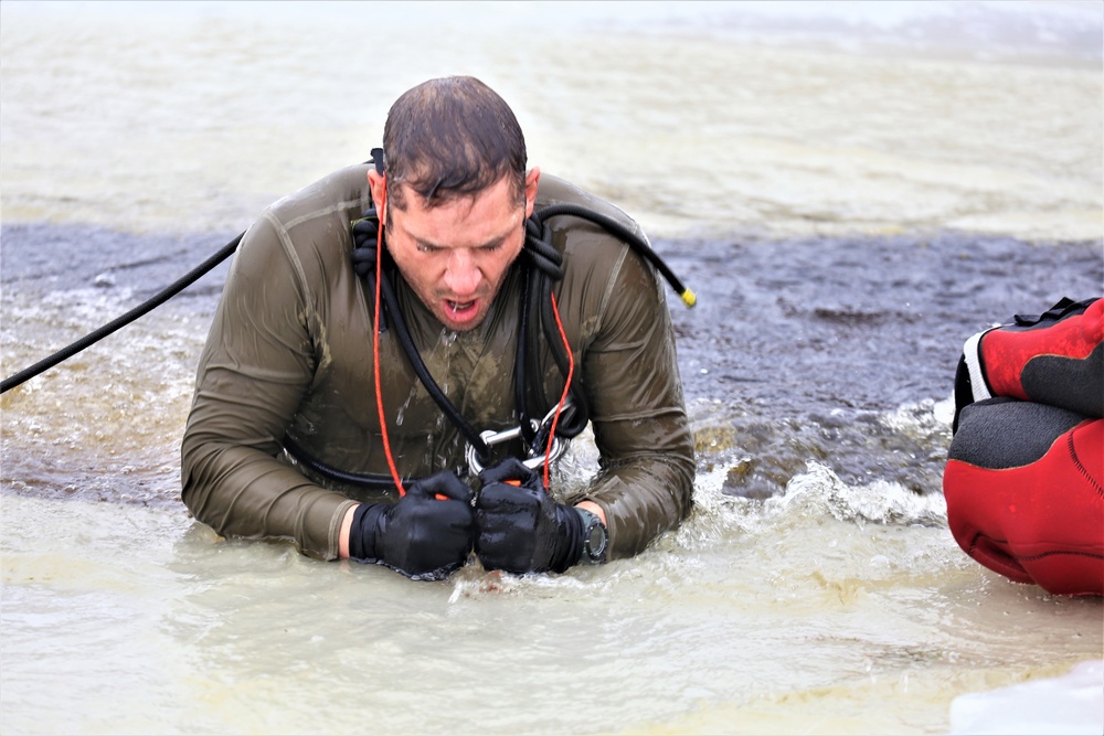 Cold-water immersion training by CWOC students at Fort McCoy