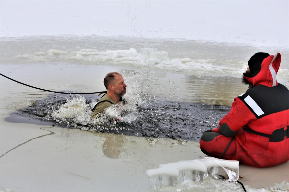 Cold-water immersion training by CWOC students at Fort McCoy