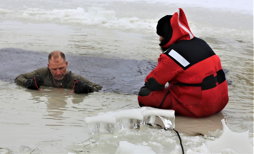 Cold-water immersion training by CWOC students at Fort McCoy